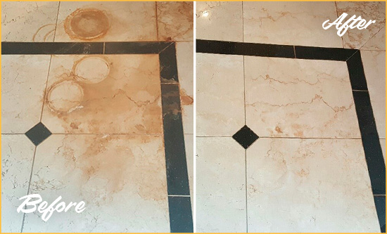 Before and After Picture of a Nashville Hard Surface Restoration Service on a Marble Floor to Eliminate Rust Stains